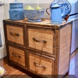 F51. Four-drawer rattan chest. 